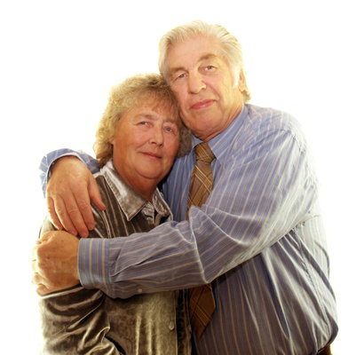 older man holding older woman