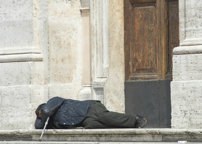 homeless man sleeping outside